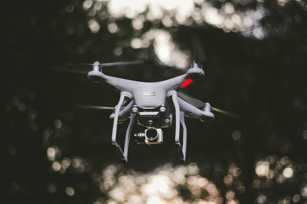 drone flying over forest