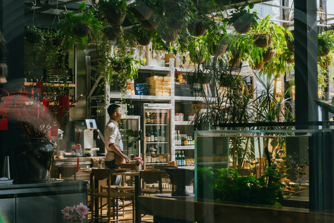Person working on a laptop at a table